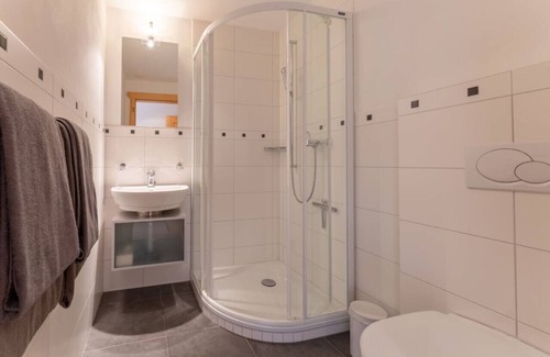Rougemont Apartment | Stylish Alps apartment near Rougemont Village with mountain views.