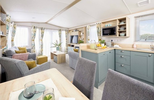 Aberystwyth House | Stylish and modern caravan with one double and two twin.