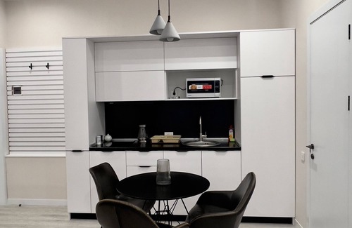 Kentron Apartment | Stylish Apartment with Open Kitchen-Living Space by Sweet Home