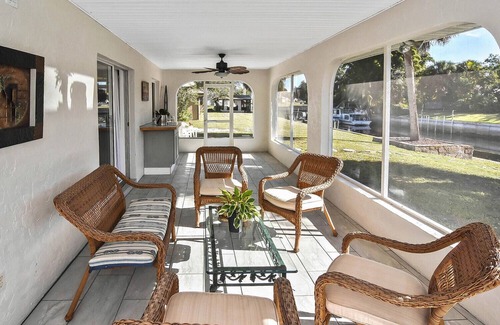 Punta Gorda House | Stylish Canal Home with King Bed and Lanai and Fishing dock