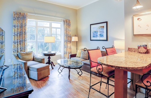 Isle of Palms Condo | Stylish condo near beach & golf with balcony, W/D, pool, hot tub, & firepit