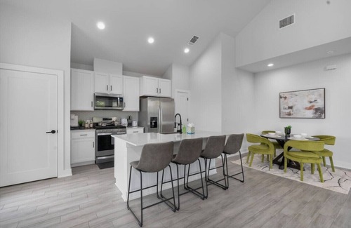 University Hills and Windsor Park House | Stylish Downtown Retreat w/Balcony, Reserved Parking + Walkable Access