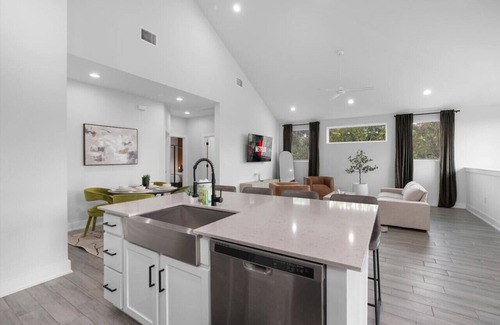 University Hills and Windsor Park House | Stylish Downtown Retreat w/Balcony, Reserved Parking + Walkable Access