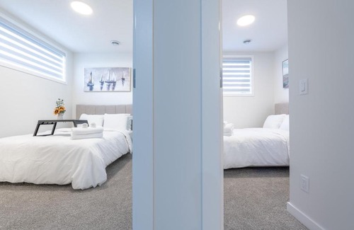 Southeast Calgary Apartment | Stylish Getaway 2BD Basement by YMCA and South Health Campus Hospital