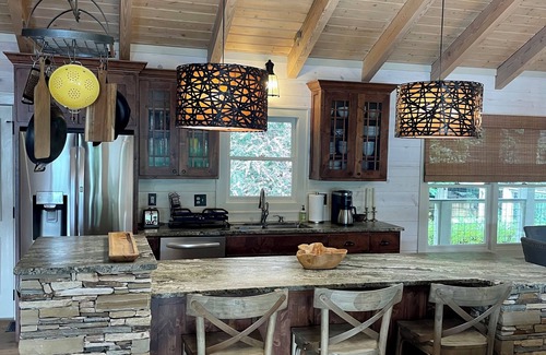 Cullowhee House | Stylish lakefront home with large flat yard, boat dock, hot tub & mountain view!