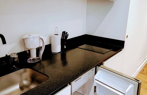 Chico Norte III Apartment | Stylish loft in Bogota. Modern amenities, smart lock, 24-hour surveillance.