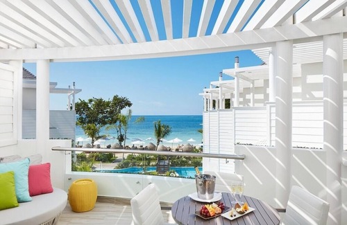 Orange Bay Apartment | Stylish Royal Suite w/King Bed, Ocean Views & Private Patio ALL-INCLUSIVE
