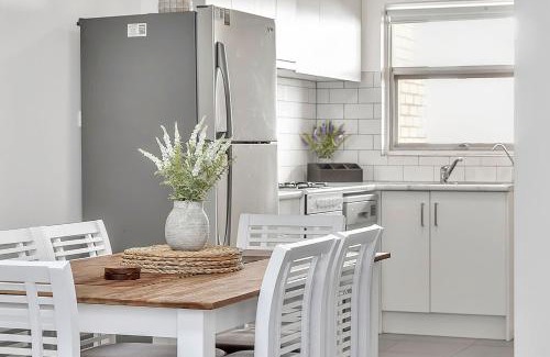 West Beach Apartment | Stylish Seaside Suite with Arcade and Balcony