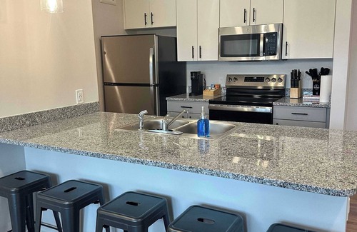 CUF Apartment | Stylish & Spacious Stay Near The Banks!