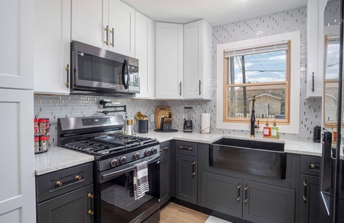 Eastside Promise Neighborhood House | Stylish Stay with Unforgettable Downtown Views!