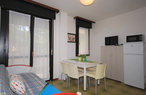 Lignano Riviera Apartment | Stylish studio apartment in pool residence