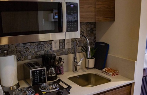 Colonia El Progreso Condo | Stylish Studio with Balcony @ Vista Vela 3, Mexico