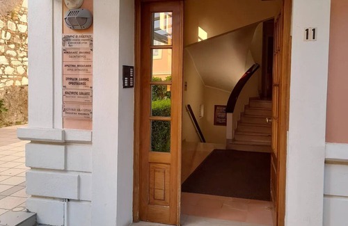 Corfu Town Apartment | Stylish tennis view apt 3 min to town/sea