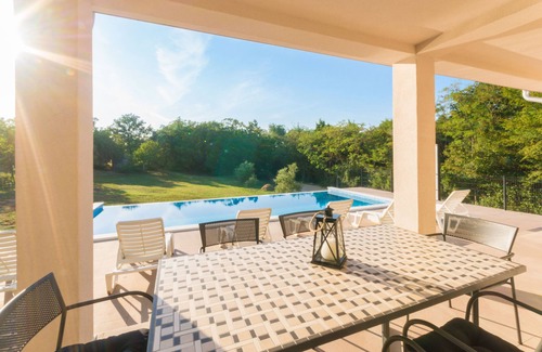 Krsan Villa | Stylish villa with large garden and inviting pool area