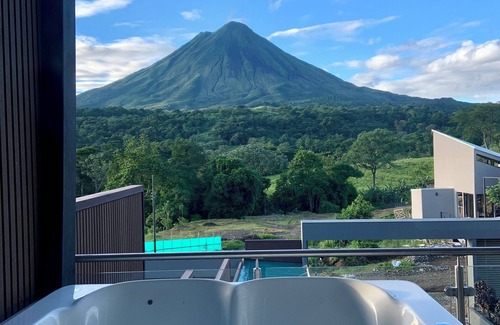 Arenal Hot Springs Villa | Stylish Volcano Villa w/Jacuzzi & Private Pool, volcano views, sun deck, WiFi