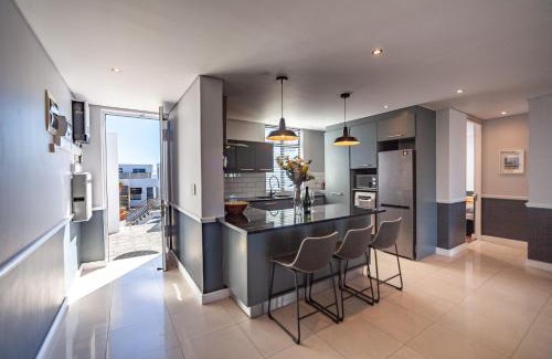 Big Bay Apartment | Stylishly Decorated Beachfront apartment w Inverter, 202 Eden