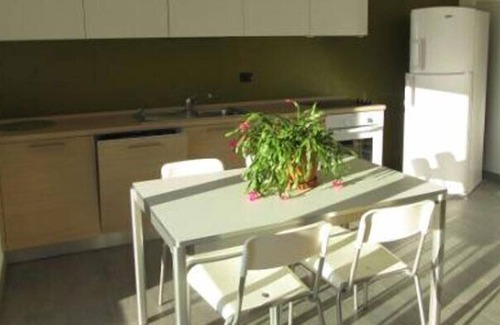 Poppino Apartment | Stylishly furnished apartment in a residence with pool and dream view