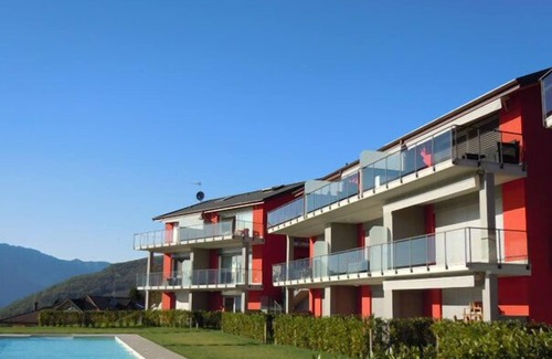 Poppino Apartment | Stylishly furnished apartment in a residence with pool and dream view