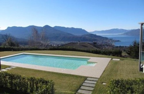 Poppino Apartment | Stylishly furnished apartment in a residence with pool and dream view