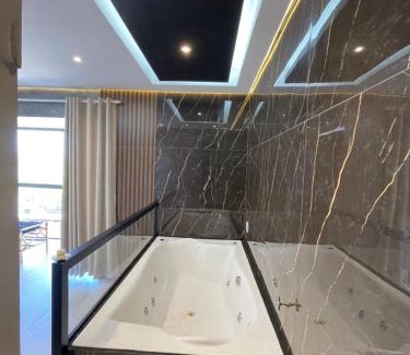 Centro Apartment | Suíte Gold com varanda e Hidro 302
