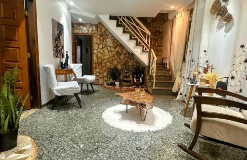Belo Horizonte House | Suite casal com frigobar