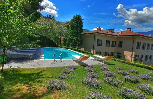 Riva Apartment | Suite "Gardone" at 2 steps from the lake with panoramic view. Lounge bar and swimming pool