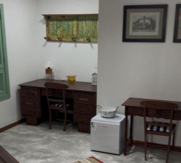 Areal House | Suite IPÊ AMARELO