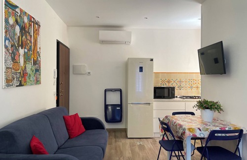 Castellammare del Golfo Apartment | SUITE DE LA SICILIENNE - with terrace, 2 kitchens and 2 bathrooms. Sea view. Downtown