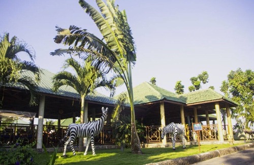 Kigamboni Apartment | Suite reflecting the essence of Swahili culture.