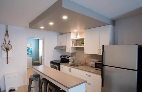Rouyn-Noranda Apartment | Suite with cloesed bedroom and sofa bed in the city center (Le Court-toit)