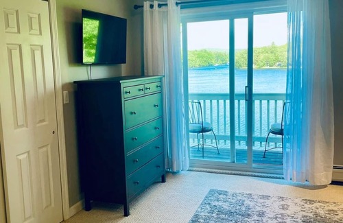 Barnstead House | Summer fun! Gameroom, kayaks, paddleboards, fire pit, screen porch, decks