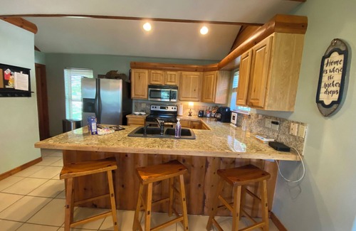 Eucha Cabin | Summer=LakeLife! Popular Grand Lake Dripping Springs cliffside lake view cabin
