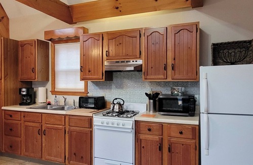 Amherst Apartment | Sun filled pool house with vaulted ceilings beautiful in ground pool and gardens