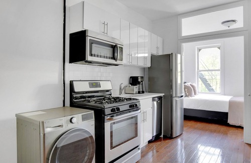 Chinatown Apartment | Sunlit LES 1BR w/W/D, steps to B/D train, by Blueground