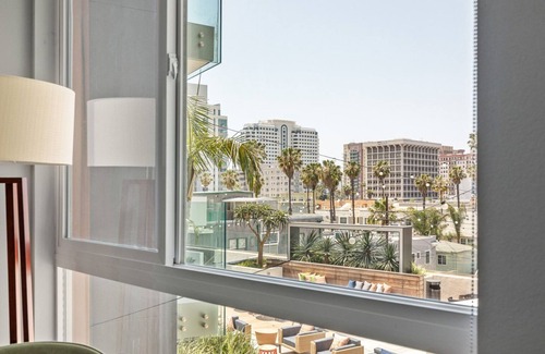 East Village Apartment | Sunlit Long Beach 1BR w/Pool & Gym, walk to Ocean Blvd, by Blueground