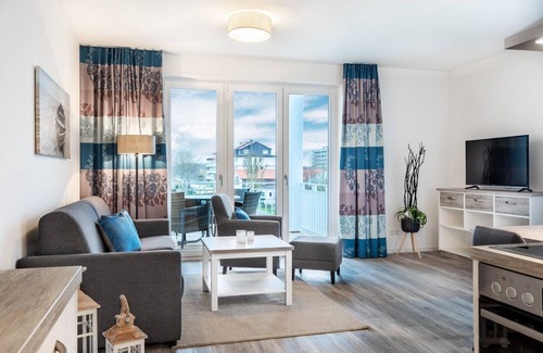Grossenbrode Apartment | Sunny apartment with balcony and sauna in the complex - only 25 meters to the Baltic Sea