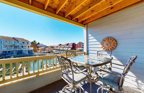 Heron Harbour Isle Condo | Sunny Condo w/Private Balcony, Free WiFi, Shared Pools, Tennis Court, and A/C