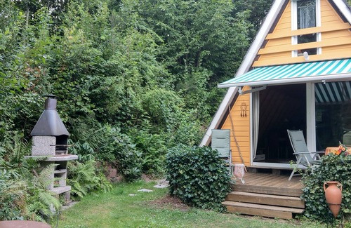 Feriendorf Eichwald Ski Chalet | Sunny holiday house with a clearing in the woods