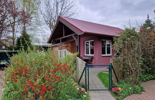 Barth House | Sunny holiday home with a cozy sleeping loft, idyllically located in the garden.