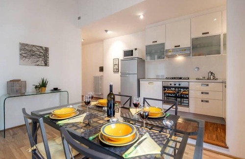 Le Cure Apartment | Sunny Open Space with Terrace close to EUI with free parking nearby!