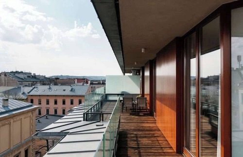 Kleparz Apartment | Sunny penthouse in New York style