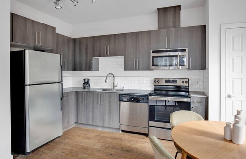 Cascade Apartment | Sunny SLU 2BR w/ BBQ & Gym, near great dining, by Blueground