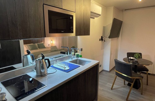 Downtown Santiago Apartment | Sunny Studio in the Center of Santiago: Your Cozy City Escape.