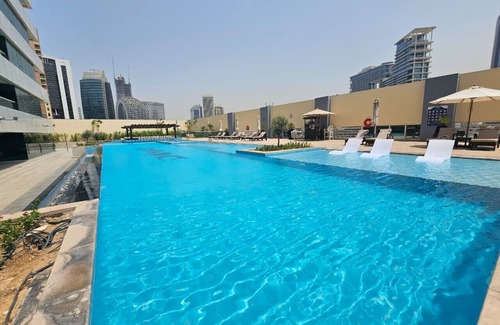 Downtown Dubai Apartment | Sunrise Homes - Chic Studio close to Dubai Mall with Canal Views