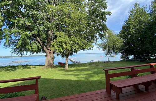 Mullett Lake House | Sunrise on Mullett Lake, 115' Lakefront sandy bottom, private dock, new remodel