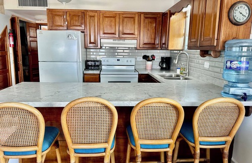 San Pedro Condo | Sunset Beach "A4" - Beachfront, Pool/Ocean View, Kayaks, Bikes, & More! 🏖