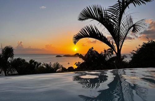 Malendure Villa | Sunset Palm - Villa Créole avec piscine face au coucher de soleil et à la réserve Cousteau