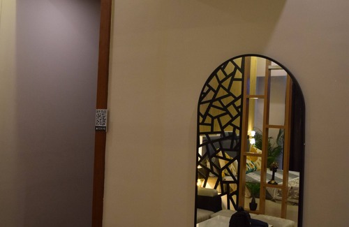 Greater Noida Apartment | Sunset View With a King Size Bed at Mall