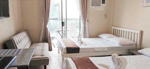 North Reclamation Area Apartment | Sunvida Tower Stays Across SM City Cebu