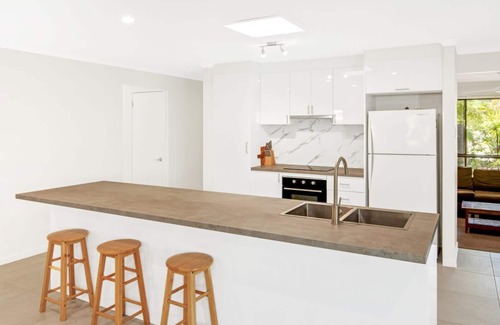 Rainbow Beach House | Sunyata Beach House - Rainbow Beach. Beachside escape with a pool, pet friendly and Wi-Fi!